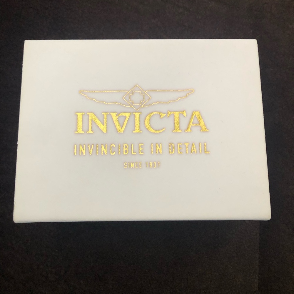 Invicta White and Gold Logo Display